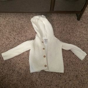White crochet baby sweater jacket